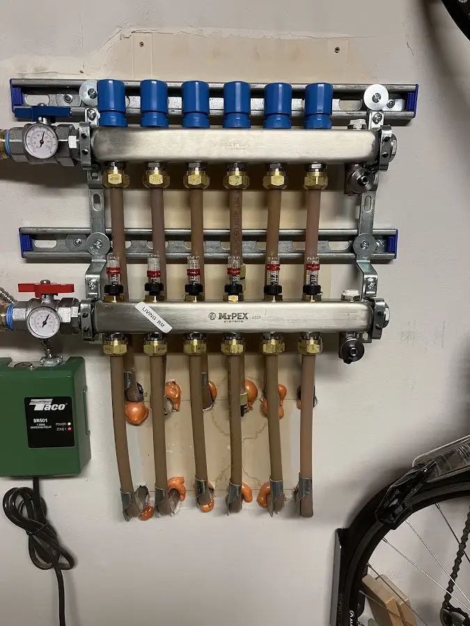 Plumber performing Water Heater Repair at a residential property in Chubbuck